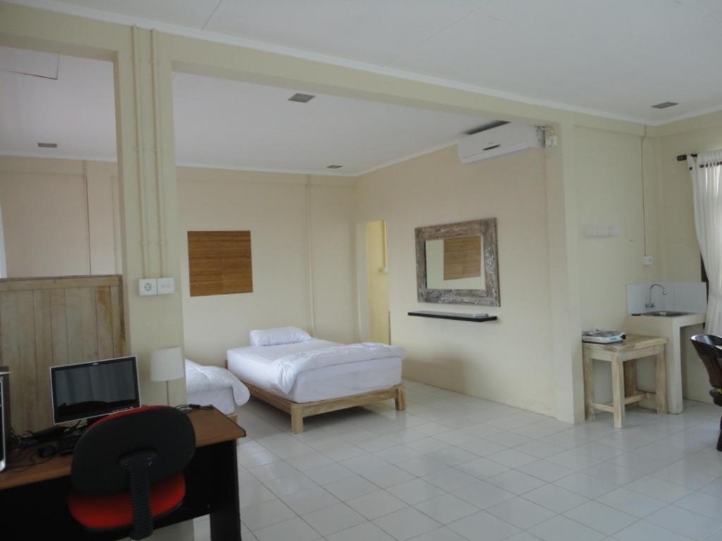 Urbanview Hotel Wayan Mansion Denpasar Pokój zdjęcie